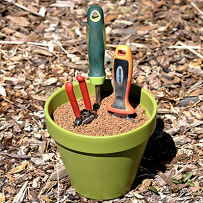DIY shelf-cleaning and sharpening garden tool holder